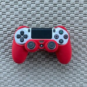 Sony PlayStation 4 (PS4) Dualshock 4 controller with red rubber cover